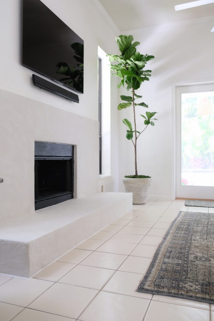 We transformed our old stone fireplace into a simple modern Spanish dream!